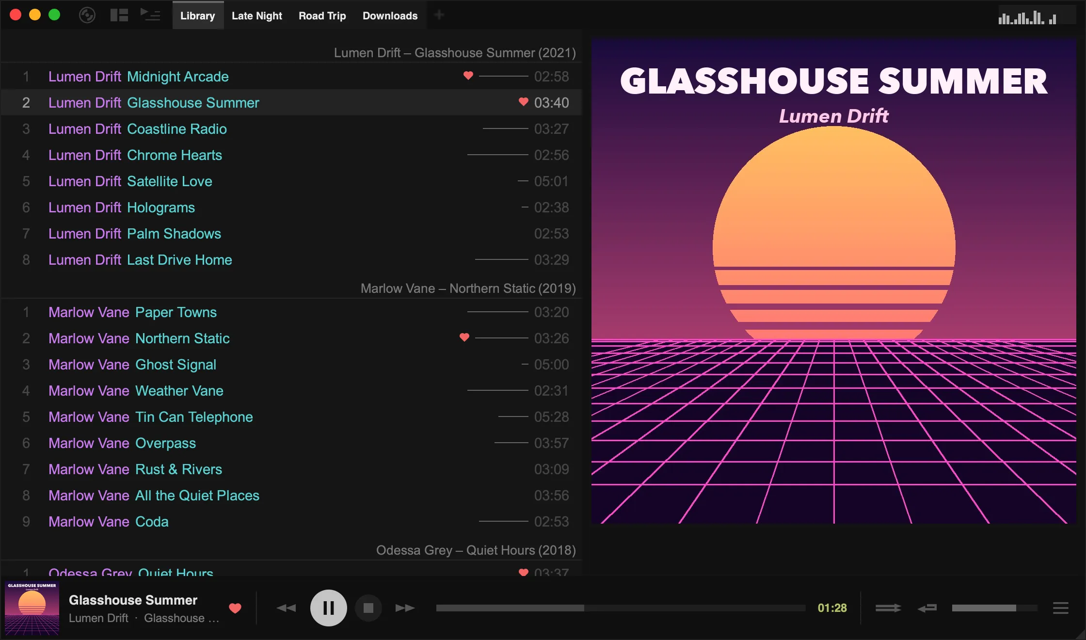 The main window with a playlist, large album art and the bottom panel
